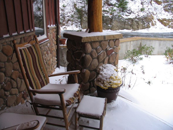 Photo of Snow Covered Porch of a Mountain Home